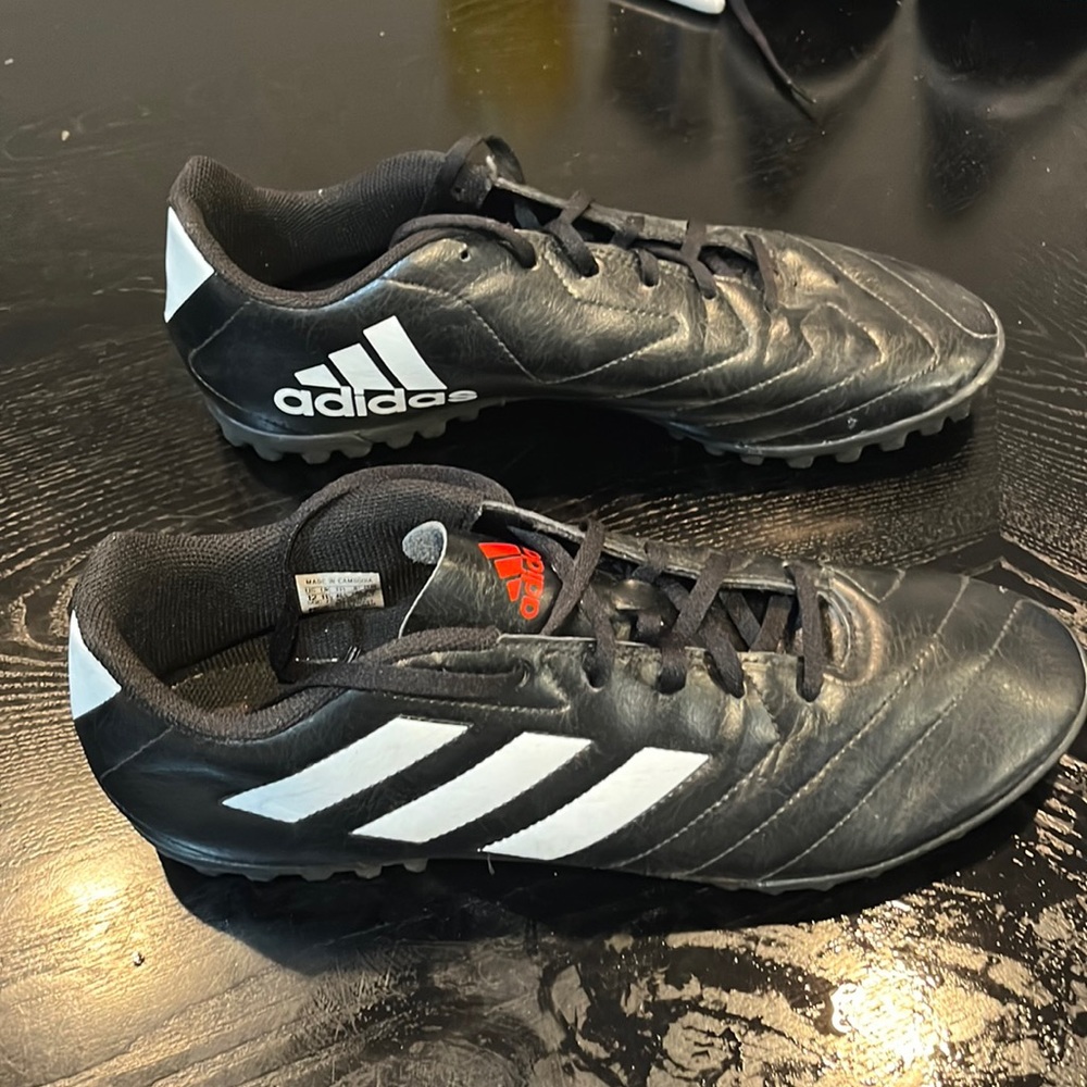 Men’s size 12 indoor soccer cleats.
